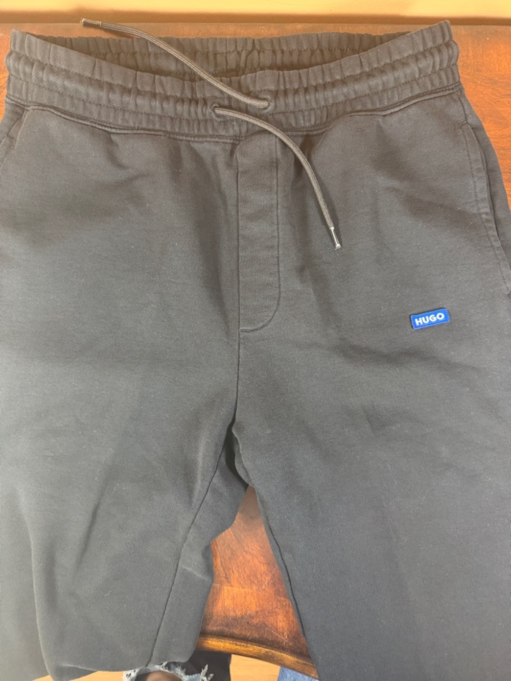 HUGO Black Jogger Pants with Blue Logo Patch
